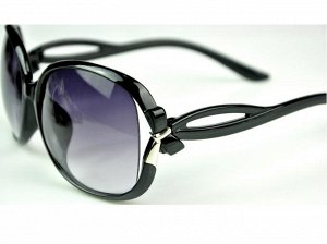 Солнцезащитные очки черные с бантиком на дужке