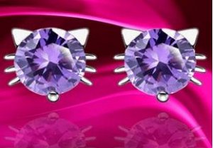 Серьги из стерлингового серебра украшенные искусственными камнями фиолетового цвета