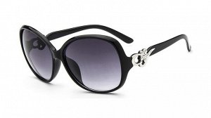 Солнцезащитные очки черные с цветочком и завитушками на дужке