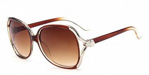 Солнцезащитные очки прозрачно-коричневые  с серебряной лисицей на дужке