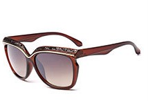Солнцезащитные очки коричневые с белыми камнями на оправе
