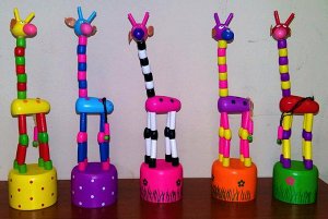 "Танцующая игрушка" Жирафик разноцветный