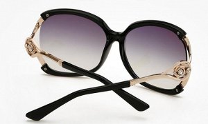Солнцезащитные очки черные с капелькой на дужке