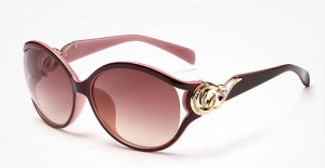 Солнцезащитные очки коричневые с красивыми завитушками на дужках