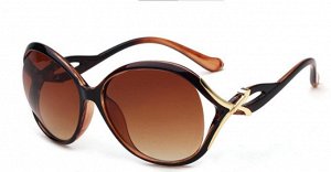 Солнцезащитные очки коричневые с перекрученной дужкой