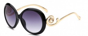 Солнцезащитные очки черные круглые с завитушкой на дужке