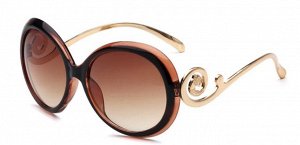 Солнцезащитные очки коричневые круглые с завитушкой на дужке