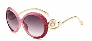 Солнцезащитные очки розово-пятнистые круглые с завитушкой на дужке