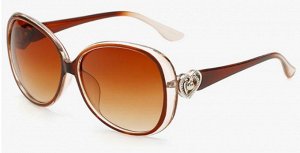 Солнцезащитные очки прозрачно-коричневые  с сердечками на дужках