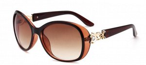 Солнцезащитные очки коричневые с ажурным орнаментом на дужках