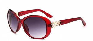Солнцезащитные очки красные с ажурным орнаментом на дужках