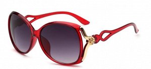 Солнцезащитные очки красные с цветочком и петлей на дужке