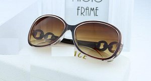 Солнцезащитные очки прозрачно-коричневые с кольцами на дужках