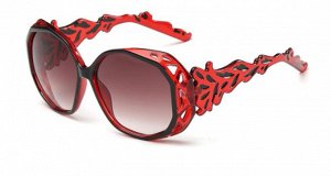 Солнцезащитные очки красные в форме многогранника с резными дужками