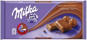 Шоколад Молочный шоколад Milka  Noisette с ореховым кремом делают из альпийского молока с добавлением крема из фундука. Оригинальная Милка с необычным ореховым вкусом из Германии удивительно нежная, п