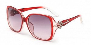Солнцезащитные очки прозрачно-красные со вставкой в виде ключика на дужке