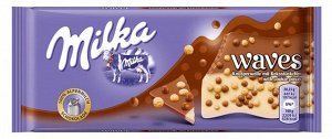 Шоколад Шоколад Milka (Милка) Waves удивляет неожиданным и изысканным сочетанием нежного молочного шоколада с вкраплениями воздушного риса и шариками темного шоколада.