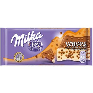 Шоколад Milka Waves with Caramel Crispearls — сочетание альпийского молочного и белого шоколада с хрустящими молочными шариками и и солёные кукурузные