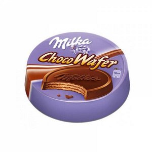 Вафли Xрустящая вафля Milka (Милка) Choco Wafer в форме медали сверху покрыта нежнейшим альпийским молочным шоколадом, а внутри сладкоежек ожидает наполнитель с какао-кремом.