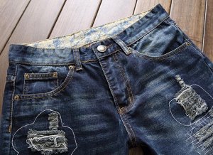Современные рваные джинсы