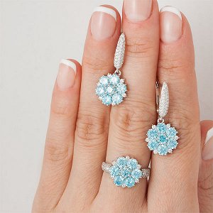 Серебряное кольцо с фианитами голубого цвета 283