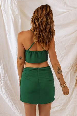 Зеленый комплект: кроп-топ с драпировкой + мини-юбка с декоративным узлом