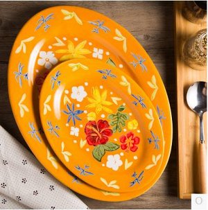 Тарелка Яркая овальная тарелка прекрасно подойдет для любого праздника и создаст вам солнечное настроение!