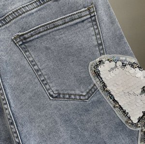 Джинсовые эластичные шорты с аппликацией из пайеток и бисера "Бант"