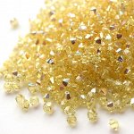 Биконусы 4мм Сваровски Jonquil AB