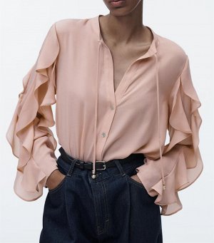 Блуза с воланами бежево-розовая