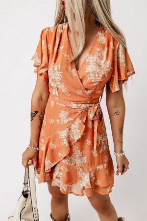 Оранжевое платье с цветочным принтом с запахом и оборками