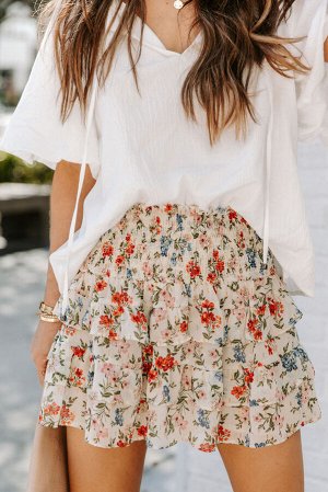 Бежевая многоярусная мини-юбка с цветочным принтом