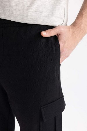 Двусторонние спортивные штаны стандартной посадки с внутренним мягким карманом-карго с перьями
