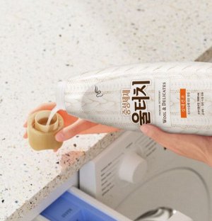 Гель для стирки концентрированный ДЛЯ ШЕРСТИ и деликатных тканей Wool Touch, нежный цветочный аромат, 1300мл, мягкая упаковка