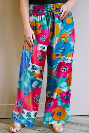 Бирюзовые брюки свободного кроя с цветочным принтом