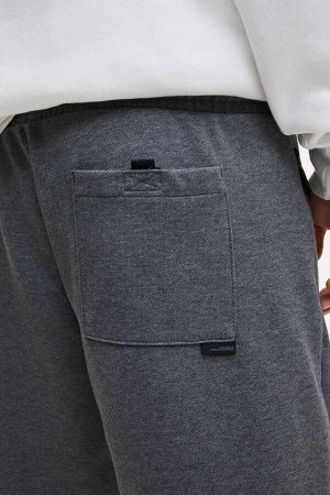 Брюки Slim Fit Jogger Bermuda 04693501