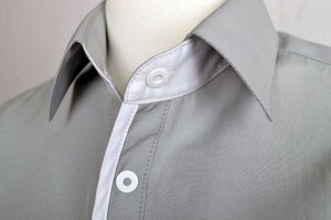 Рубашка Сорочка детская. Длинный рукав. Состав ткани:80% хлопок/20%полиэстер.
Модель на кнопке. Один накладной карман.