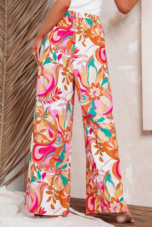Оранжевые брюки-палаццо с флористическим принтом
