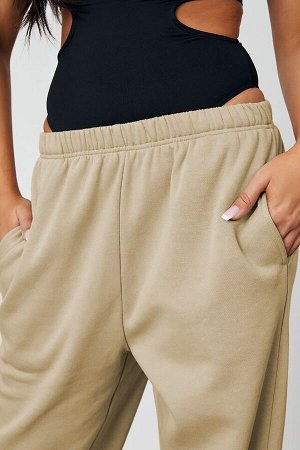 Женские бежевые спортивные штаны оверсайз с эластичной резинкой на талии Mg1235 MG1235
