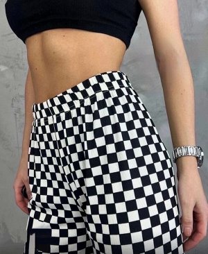 Женские брюки с шахматным принтом/Брюки-клеш женские