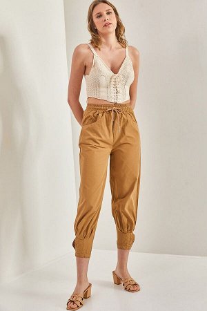 Женские брюки с эластичной резинкой на талии и штанинами на кнопках 40811007