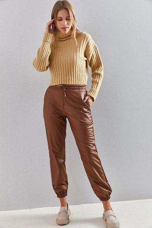 Женские эластичные кожаные брюки на талии и штанинах 40201018