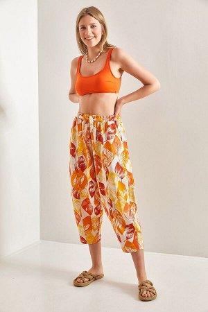 Женские широкие брюки с эластичной талией и разноцветным рисунком 40841017