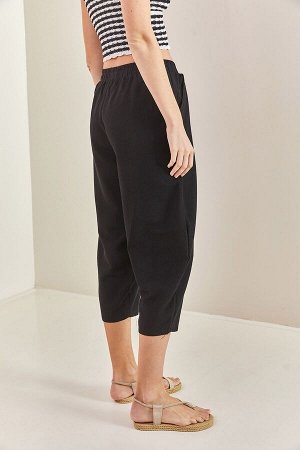 Женские широкие льняные брюки с эластичной талией 40701033
