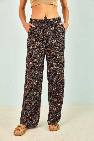 Женские черные брюки из вискозы с эластичной талией и цветочным узором 30021031