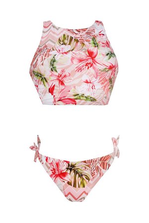 Раздельный купальник из коллекции Tropical Fever c ярким принтом. Топ со съемными вкладышами. На спинке удобная застежка и фигурный вырез. Плавки-слипы на завязках.