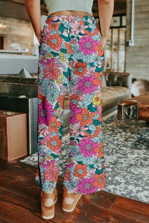 Розовые брюки свободного кроя с цветочным принтом