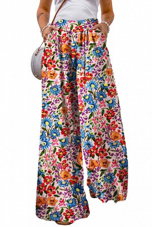 Голубые брюки-палаццо с цветочным принтом и карманами