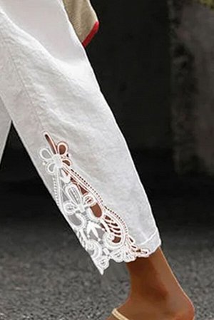 Белые свободные брюки из хлопка с кружевными вставками