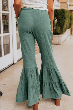 Зеленые брюки-клеш из текстурированной ткани со сборками